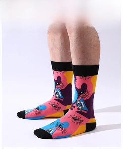 Detail shot of pop art crew socks featuring eye patterns and vibrant geometric colors