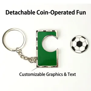 Soccer ball metal keychain with a detachable game coin and green base plate
