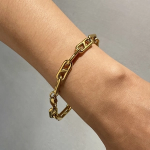 Elegant gold stainless steel chunky chain bracelet worn on wrist for a minimalist style