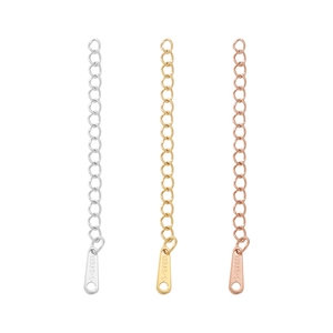 Detail of stainless steel extender chains in silver, gold, and rose gold finishes
