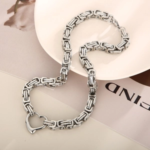 Byzantine stainless steel chain set with a hollow heart pendant for a punk street style