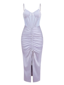 Detail of lavender satin dress featuring corset boning and drawstring pleated slit