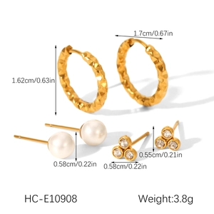 Detailed set of hammered steel hoop earrings with pearl studs and zircon stones shown with dimensions