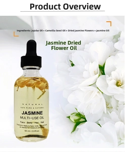 Macro shot of 60ml jasmine multi-use oil bottle with dried flowers and jojoba oil