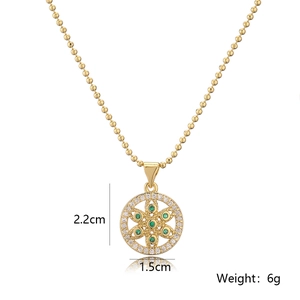 Detailed view of Tree of Life pendant with green zircons, size 2.2cm by 1.5cm