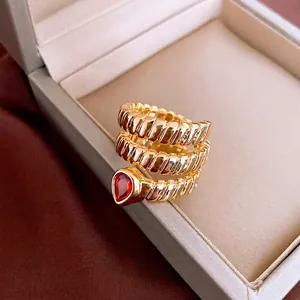 Gold-plated multi-layer snake ring with pear-shaped red zircon in luxury velvet box