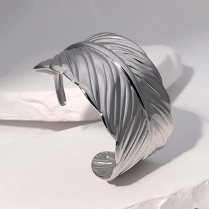 Minimalist silver stainless steel leaf cuff bracelet with feather texture detail