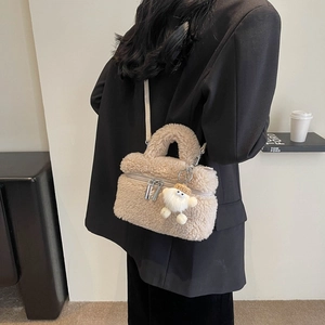 Beige faux fur handbag with mushroom pendant charm and adjustable strap for women