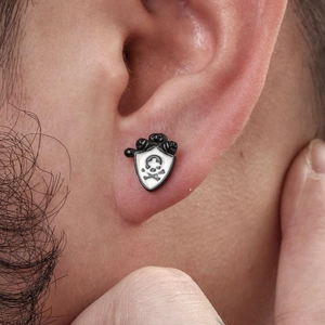 Men's gothic stainless steel stud earring featuring a skull shield design on ear