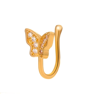 Non-pierced gold butterfly nose clip with sparkling zircons on white background