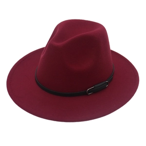 Detailed close-up of wine red wool fedora hat with black leather belt and silver buckle