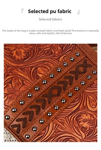 Detail of bohemian brown PU leather bag with floral embossing and metal rivet accents