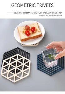 Détail macro des dessous de plat hexagonaux en TPE avec design géométrique ajouré et texture