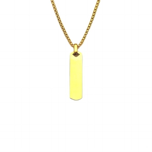 Detailed view of a polished golden rectangular pendant on a matching box chain necklace