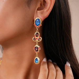 Detail view of vintage multi-layered royal style necklace with colorful teardrop pendants