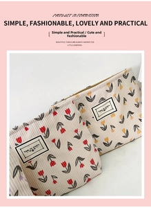 Detail of corduroy makeup bag featuring floral tulip patterns and time to party label
