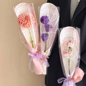 Elegant single flower bouquets with romantic floral cards and purple ribbon packaging