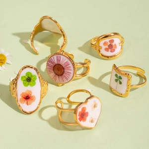 Handmade gold plated open rings with colorful real dried flower specimens in resin
