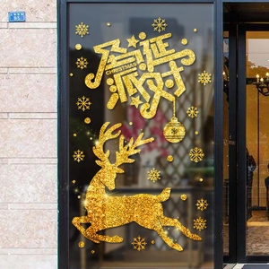 Golden glitter Christmas reindeer wall decals with snowflakes on a glass storefront window