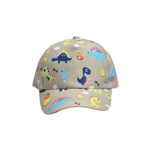 Close-up of khaki children baseball cap featuring colorful dinosaur print and sun brim