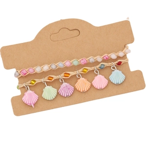Bohemian woven shell charm bracelets for women in colorful summer beach style