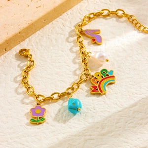 Golden chain bracelet with purple flower, rainbow crown, and pearl charms for women