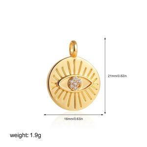 Detail of 18K gold evil eye charm with sunbeam design, size 21x16mm, weight 1.9g