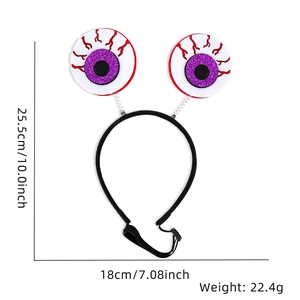 Halloween headband featuring googly eyeballs with purple glitter and size dimensions