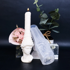 Classic Venus bust candle and silicone mold set with floral decor in a dark setting