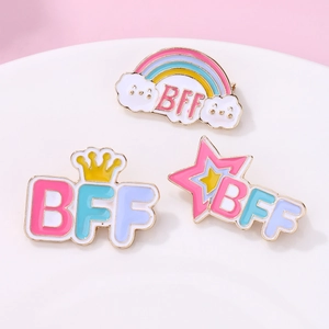 Set of 3 BFF enamel pins featuring a colorful rainbow cloud, crown, and gold star