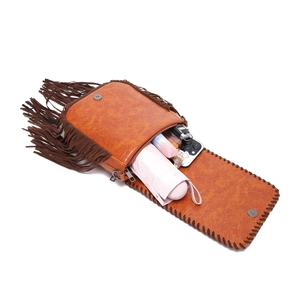 Detailed view of bohemian brown fringe crossbody bag showing large internal storage capacity