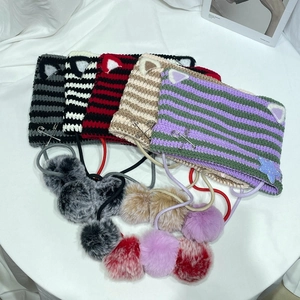 Cute knitted cat ear beanies with pom-poms and metal pins in various striped colors