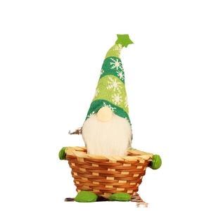 Christmas gnome candy basket with green striped hat and white beard on a woven base