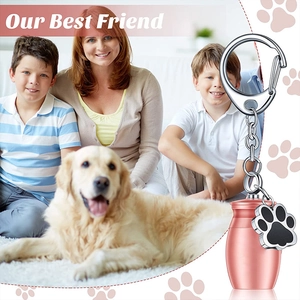 Rose gold pet cremation urn keychain with dog paw pendant and Our Best Friend script