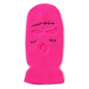 Detail of hot pink 3-hole knitted balaclava with NOT NICE text embroidery