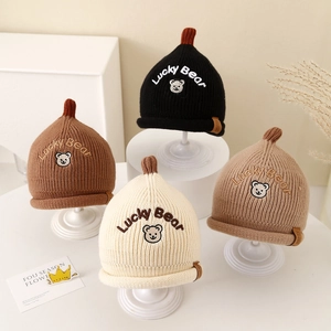 Winter knitted baby hats set with Lucky Bear embroidery and warm ribbed texture