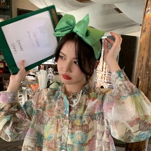 Green seersucker oversized bow headband styled on model for a sweet Korean fashion look
