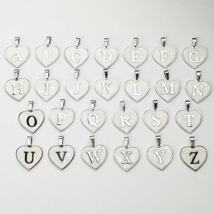 Collection of heart-shaped shell necklaces featuring capital A-Z alphabet engravings