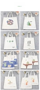 Detailed grid of white canvas tote bags featuring diverse custom artistic prints