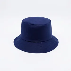 Dark blue reversible cotton bucket hat for families with size labels and dimensions