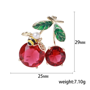 Exquisite cherry brooch with red zircons, green leaves and a small pearl bee