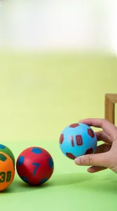 Close-up of colorful 6cm mini sports balls with numbers for toddler athletic training
