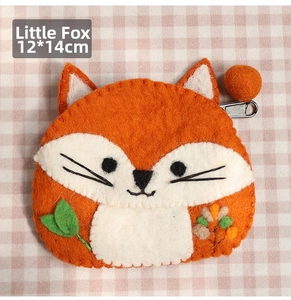 Detailed view of handmade wool felt fox coin purse with floral embroidery 12x14cm