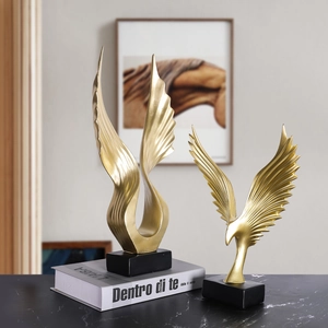 Modern abstract golden eagle sculpture set with black marble base for home office decor