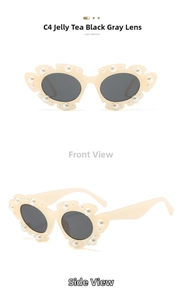 Detail of floral tea-colored frames with inlaid white pearls and dark grey lenses