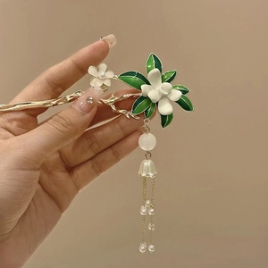 Pic à cheveux vintage gardénia avec branche dorée et feuilles en émail vert