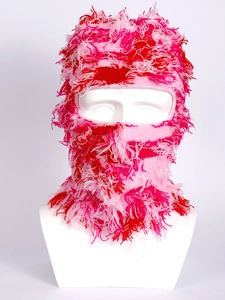 Close-up of pink and red fuzzy knit balaclava showing plush texture and winter warmth
