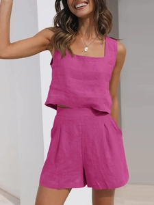 Detail of rose pink linen two-piece set featuring square neck top and high waist shorts