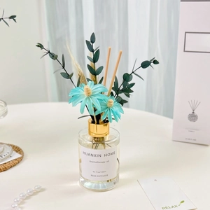 120ml reed diffuser set with blue sunflowers and eucalyptus leaves in clear glass bottle