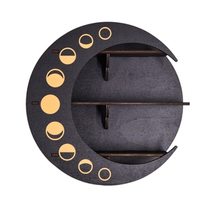 Macro view of moon shaped wooden display shelf with moon phase cutout details